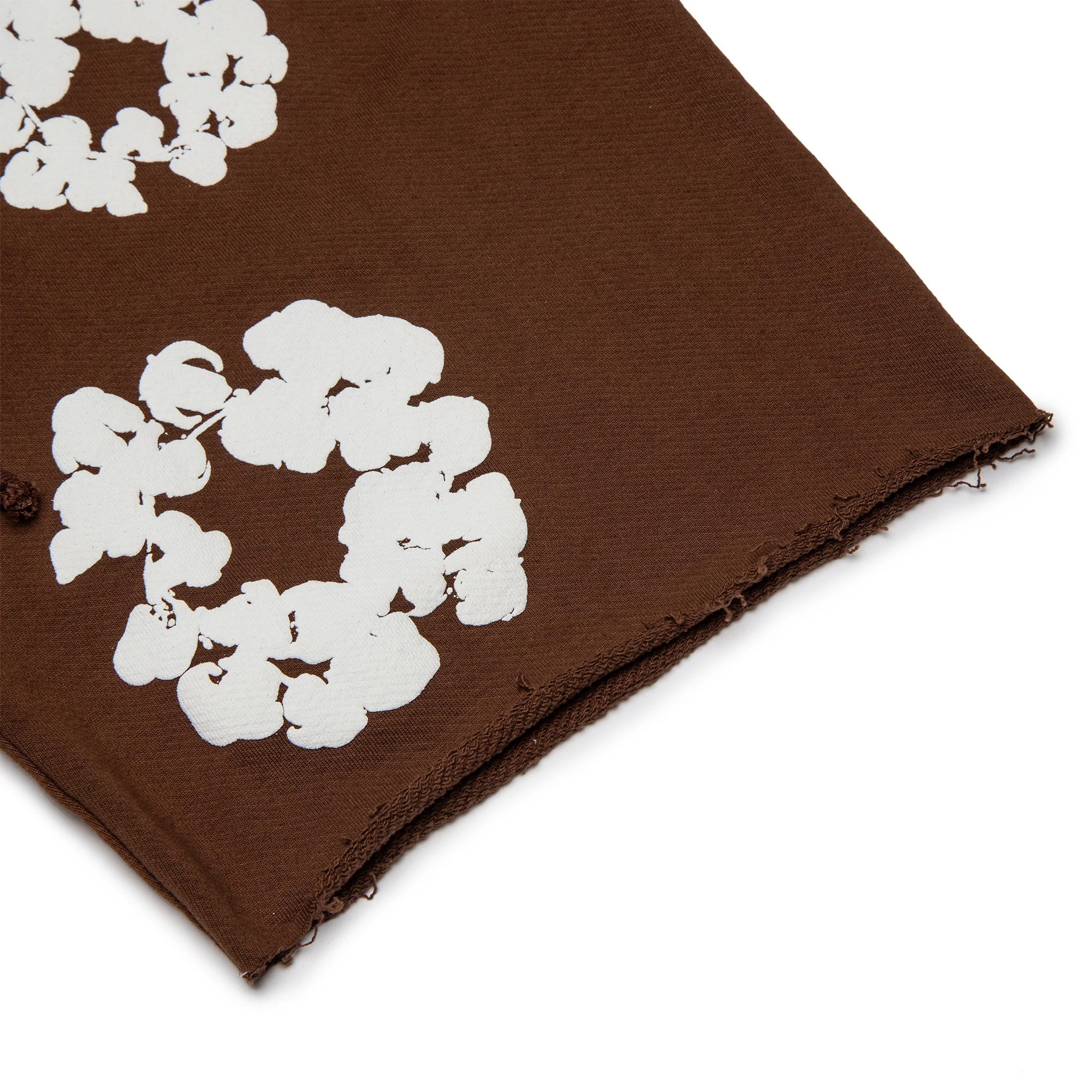 Leg view of Denim Tears The Cotton Wreath Brown Shorts